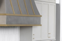 Large-stainless-steel-and-gold-range-hood-2